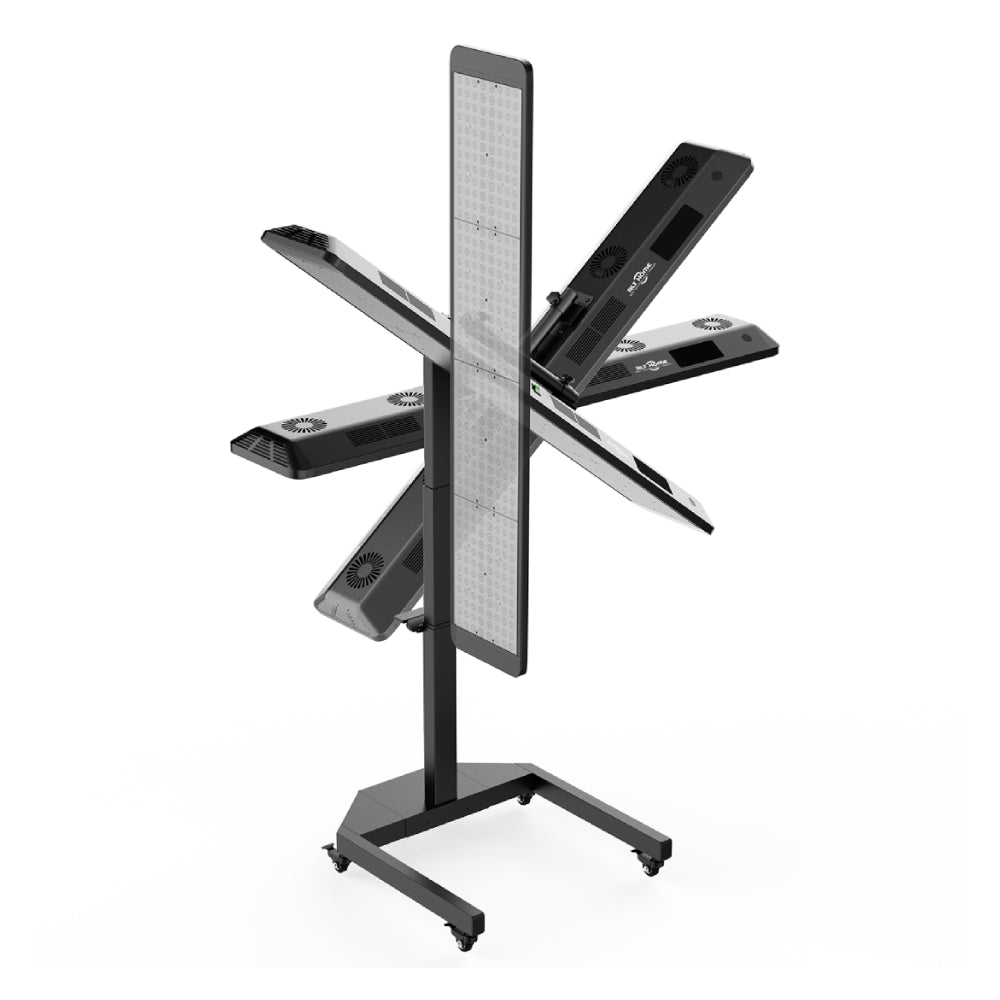 Full-body red light therapy panel on an electric floor stand in a warm minimalist room